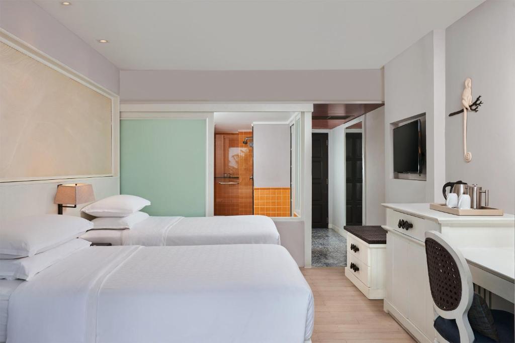Postel nebo postele na pokoji v ubytování Sheraton Samui Resort