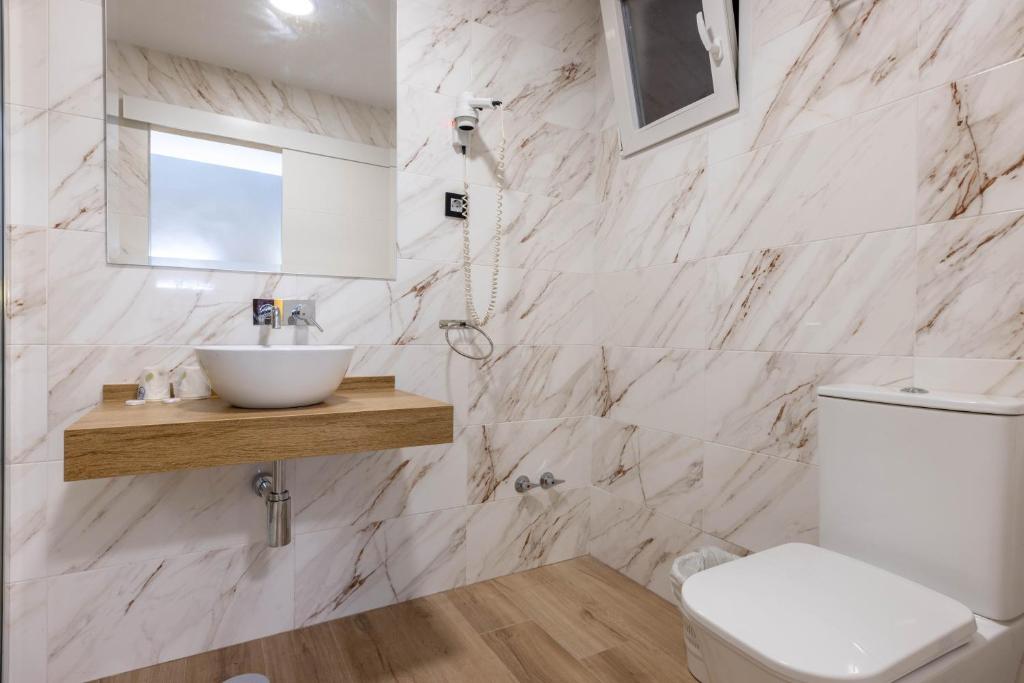 Kúpeľňa v ubytovaní Hotel Copacabana Tarifa Beach