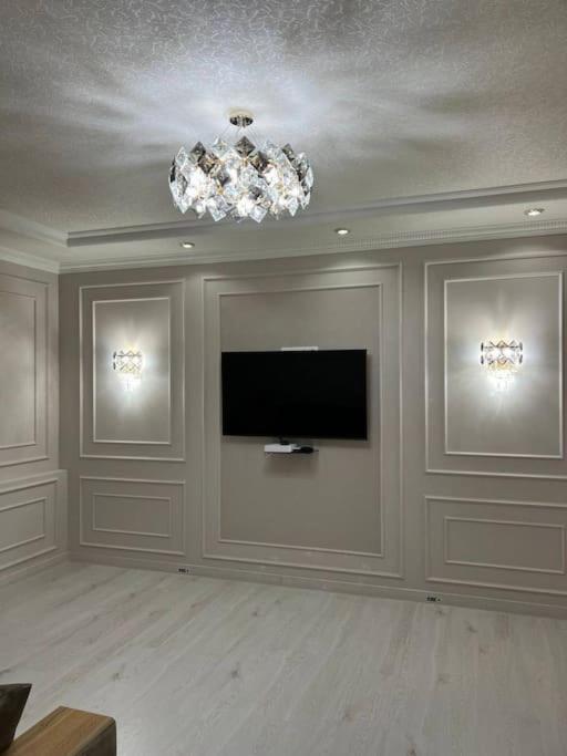 TV a/nebo společenská místnost v ubytování Miracle Apartment