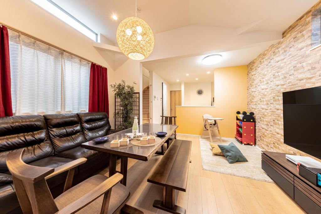 Una televisión o centro de entretenimiento en CuteFamilyHouse! 3LDK 6minShinjuku 3minJRsta Cozy,Fun,Bright! KidsFree Under6yrs