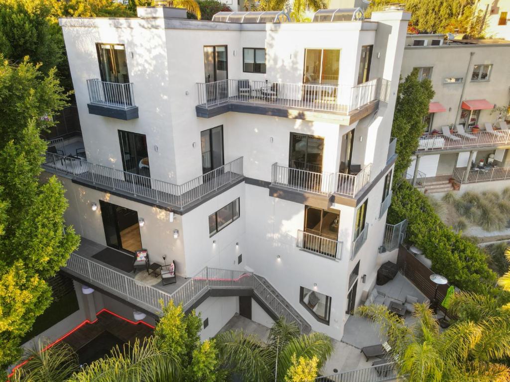 an aerial view of a white building with balconies at Villa Alana in Los Angeles