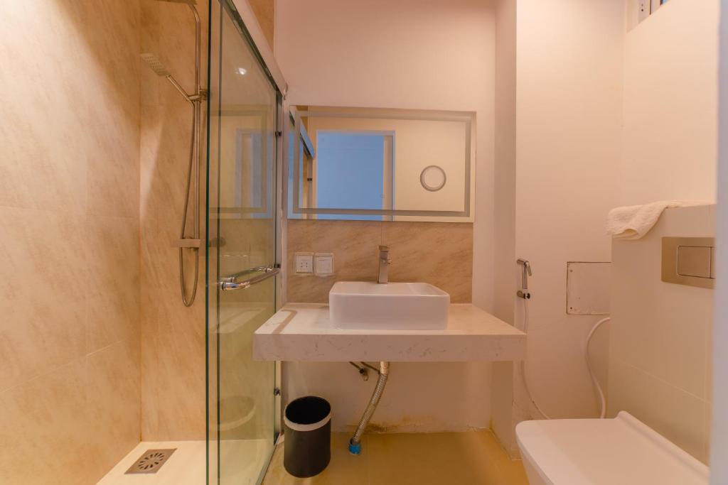 Koupelna v ubytování Si! Coral Inn