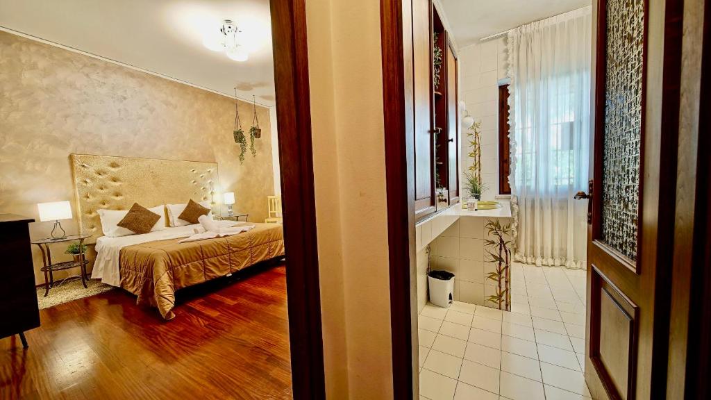 Postel nebo postele na pokoji v ubytování Vitti's Home Verona