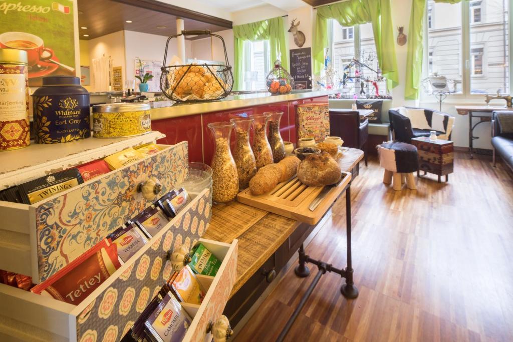 a store filled with lots of different types of food at Hotel Ambassador in Solothurn