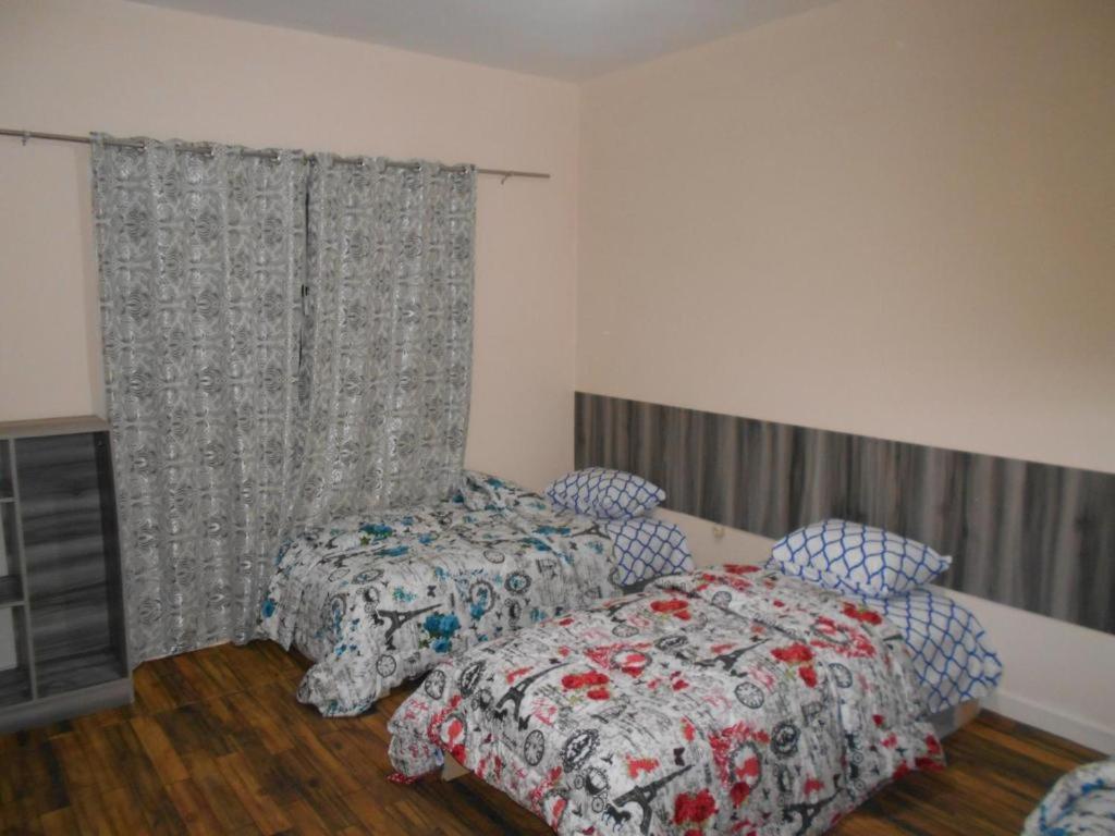 A bed or beds in a room at Anas House2