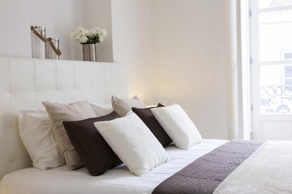 Postel nebo postele na pokoji v ubytování JOIVY Downtown Blue Apartments