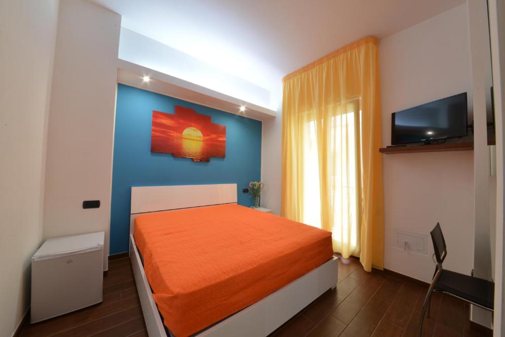 Postel nebo postele na pokoji v ubytování B&B Casa Camasso