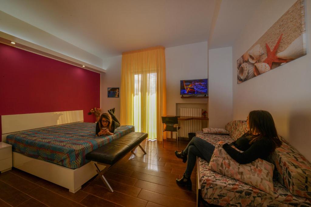 TV a/nebo společenská místnost v ubytování B&B Casa Camasso