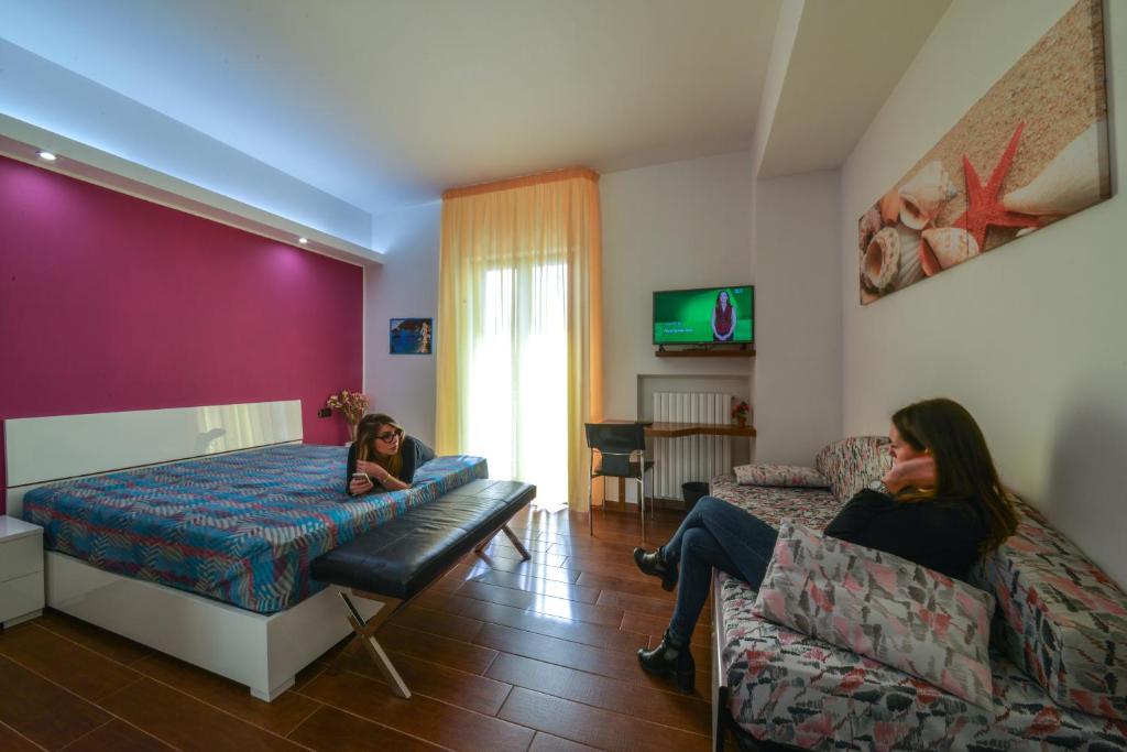TV a/nebo společenská místnost v ubytování B&B Casa Camasso