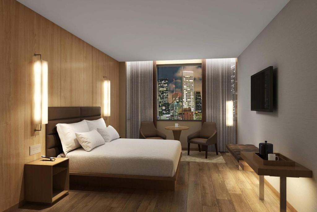 Postel nebo postele na pokoji v ubytování AC Hotel by Marriott Phoenix Downtown