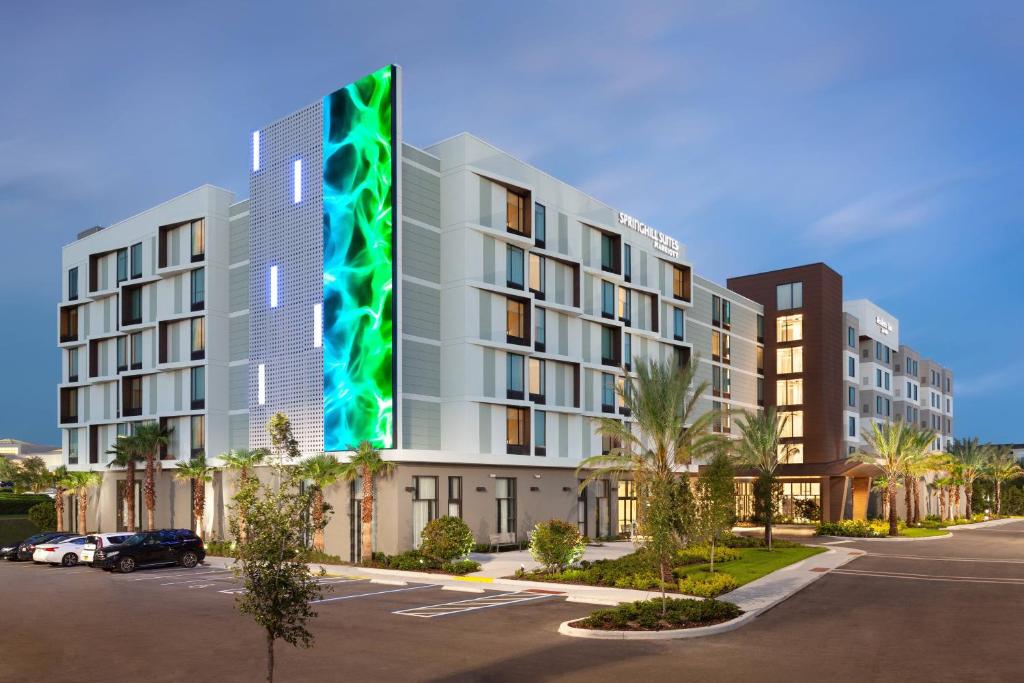 a rendering of a building in a parking lot at SpringHill Suites by Marriott Orlando at Millenia in Orlando