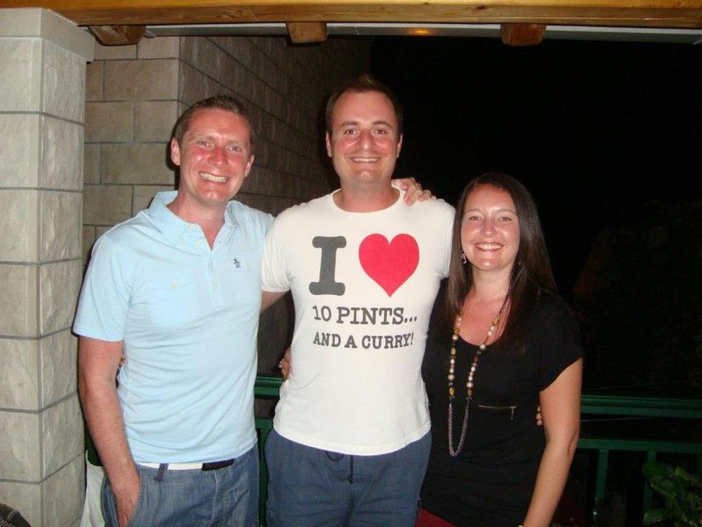 two men and a woman posing for a picture at Apartments Baltazar in Dubrovnik