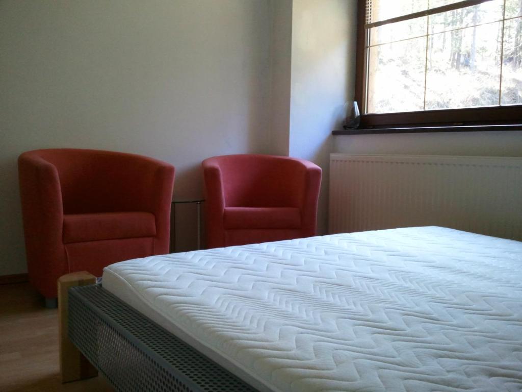 Łóżko lub łóżka w pokoju w obiekcie Karpacz 30