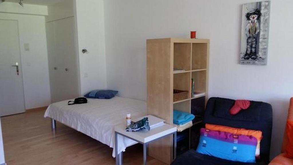 Postel nebo postele na pokoji v ubytování 1,5 Zimmer-Ferienwohnung WildhausLisighaus
