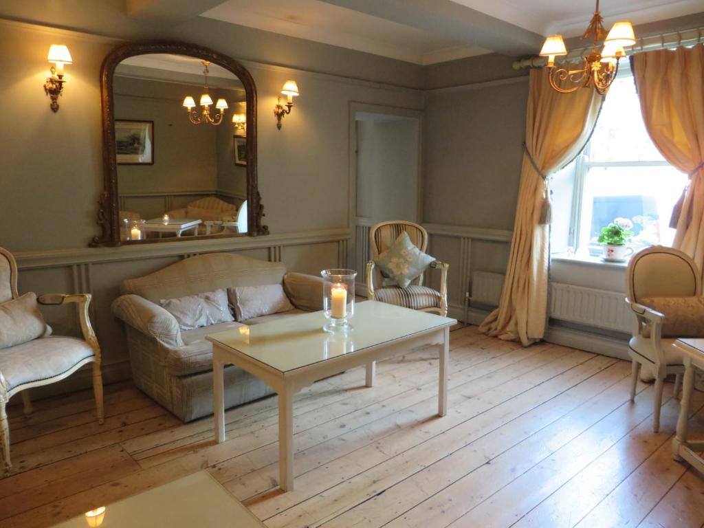 Zona de estar de Conyngham Arms Hotel