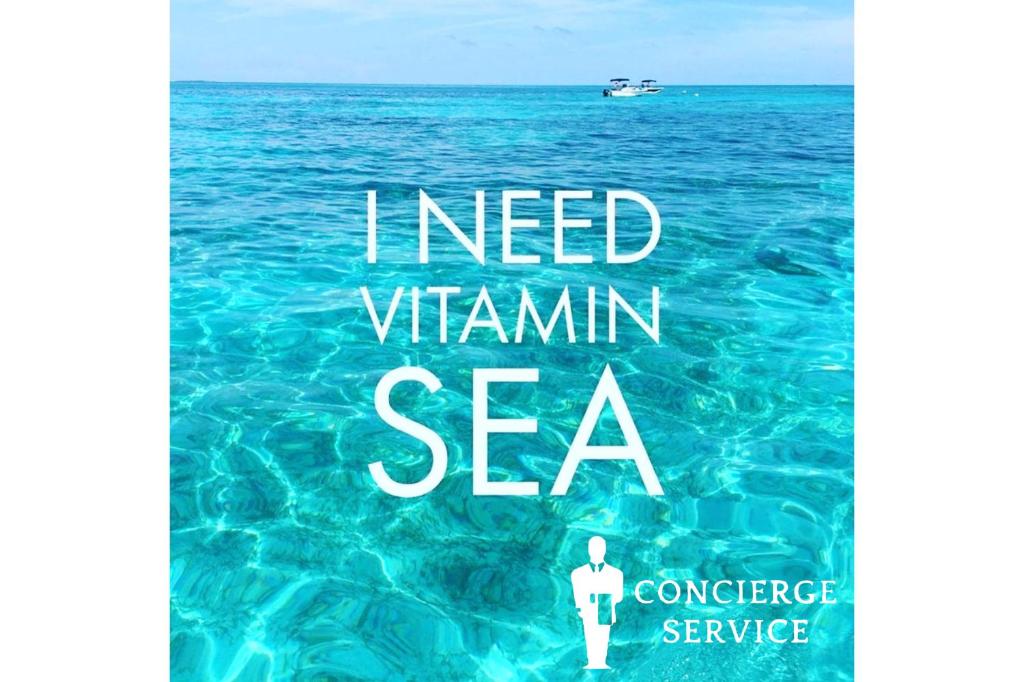 Una portada de libro de I need vitamin sea en LUX 4 Bedrooms Private HTD Salt Water Pool With Concierge Service, en Deerfield Beach
