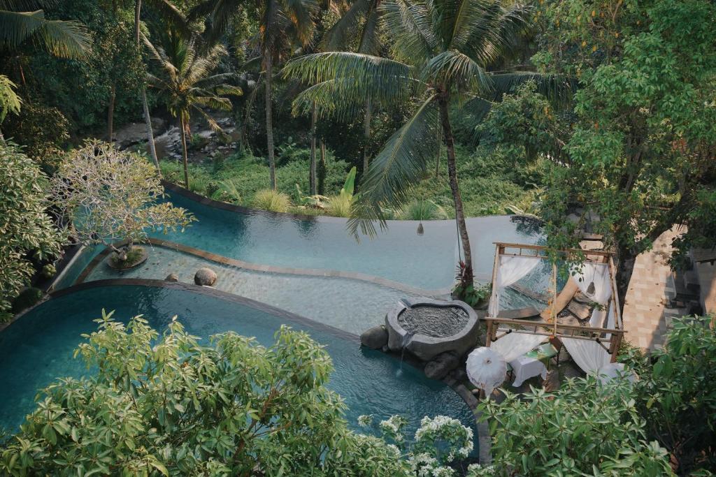 an aerial view of a swimming pool in a resort at Bucu View Resort in Ubud