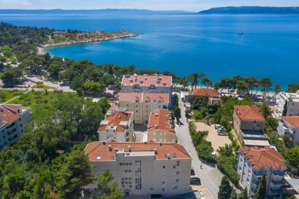 an aerial view of a town by the water at Apartments Mari - 40m from the beach in Makarska