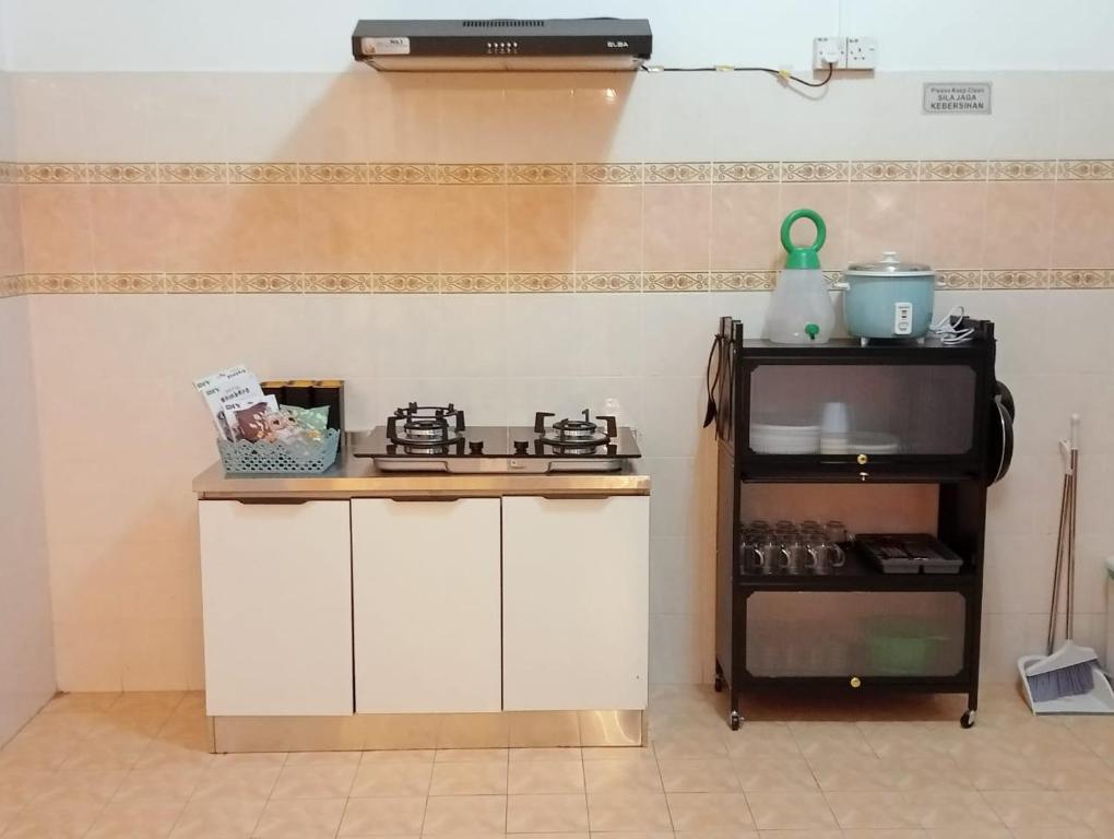Virtuvė arba virtuvėlė apgyvendinimo įstaigoje The Beach House @ Kuantan