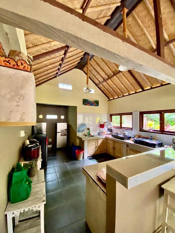 Posezení v ubytování Ulami Guest House Tejakula
