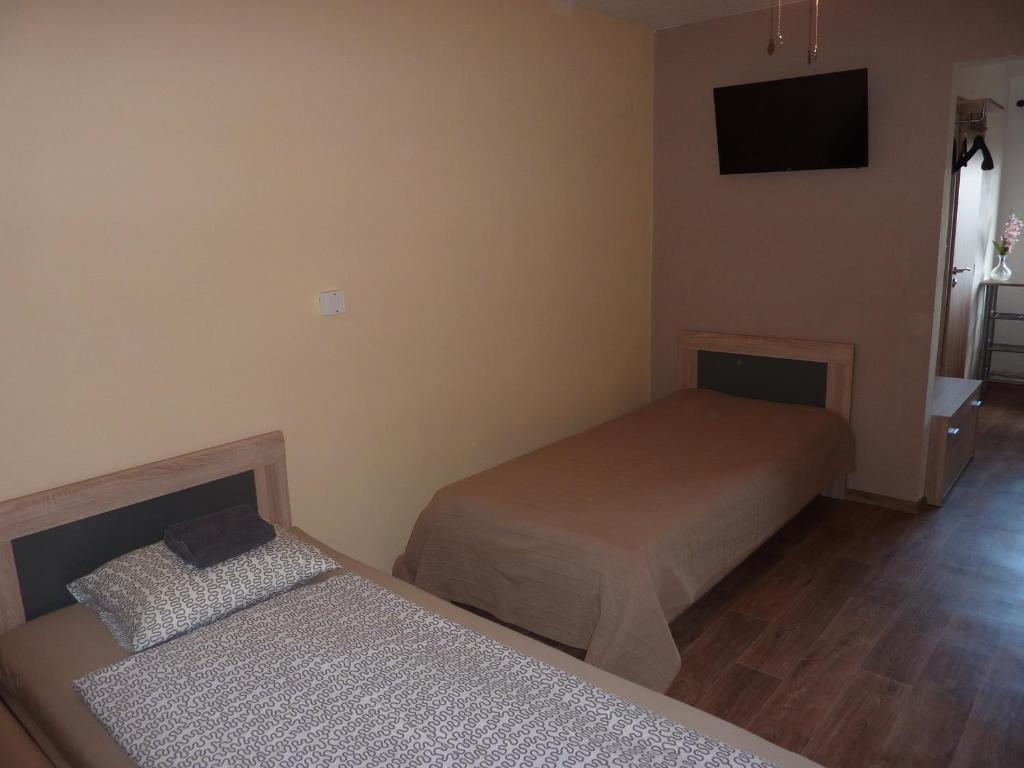 Postel nebo postele na pokoji v ubytování Penzion Čech