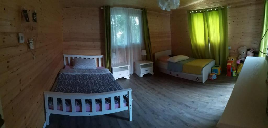 Postel nebo postele na pokoji v ubytování Cabana Oprișor