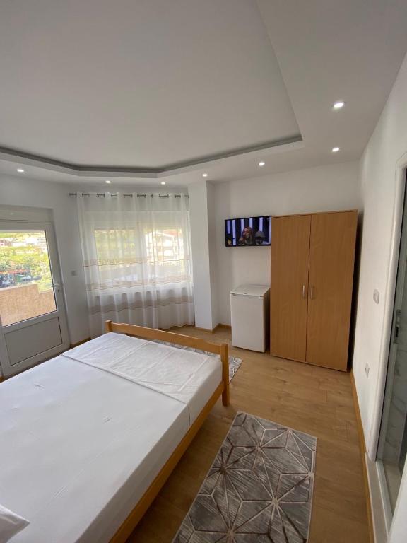 Postel nebo postele na pokoji v ubytování Ceka Apartments