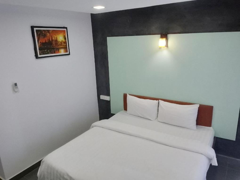 Postel nebo postele na pokoji v ubytování Shalima Guesthouse