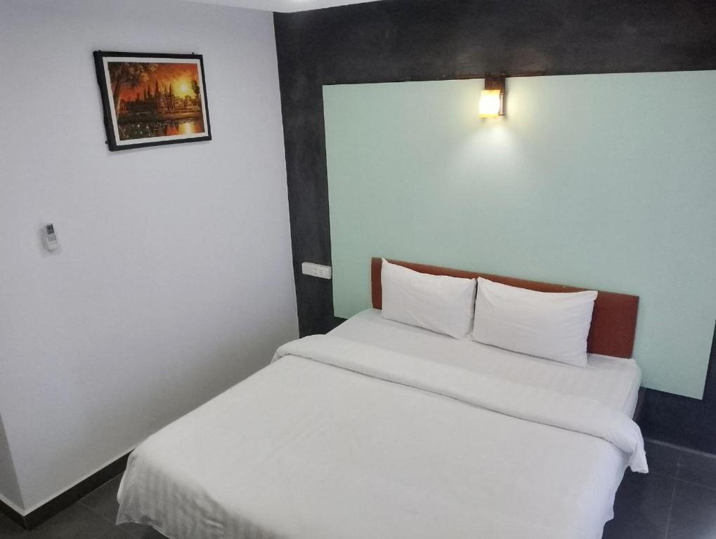 Postel nebo postele na pokoji v ubytování Shalima Guesthouse