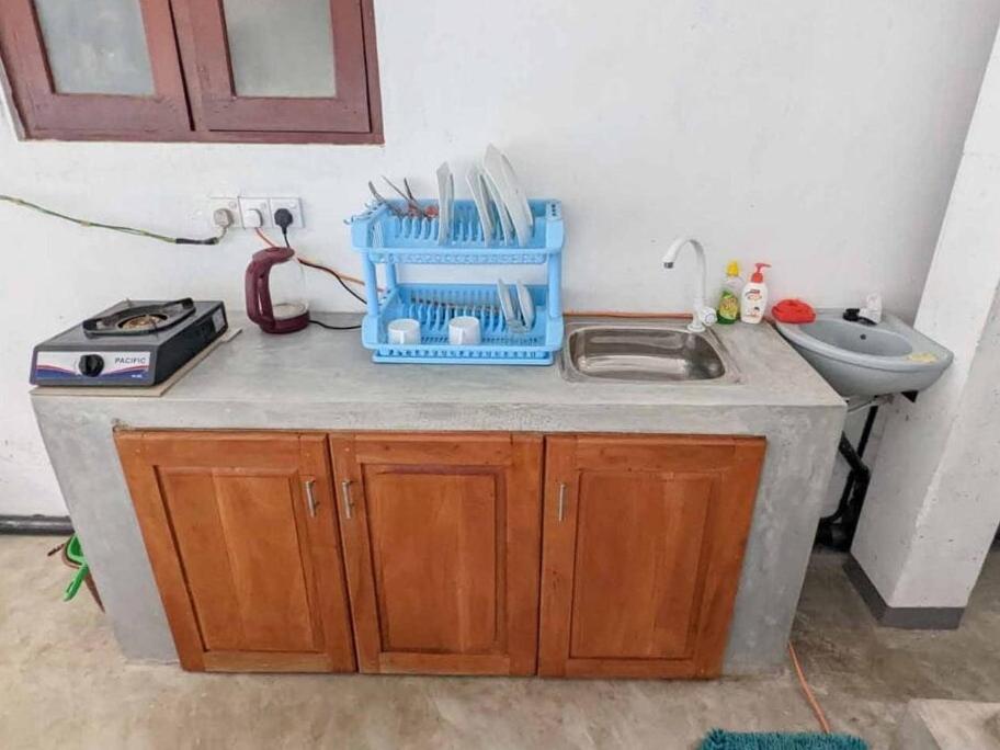 Kuchyň nebo kuchyňský kout v ubytování Villa Wismar Hikkaduwa