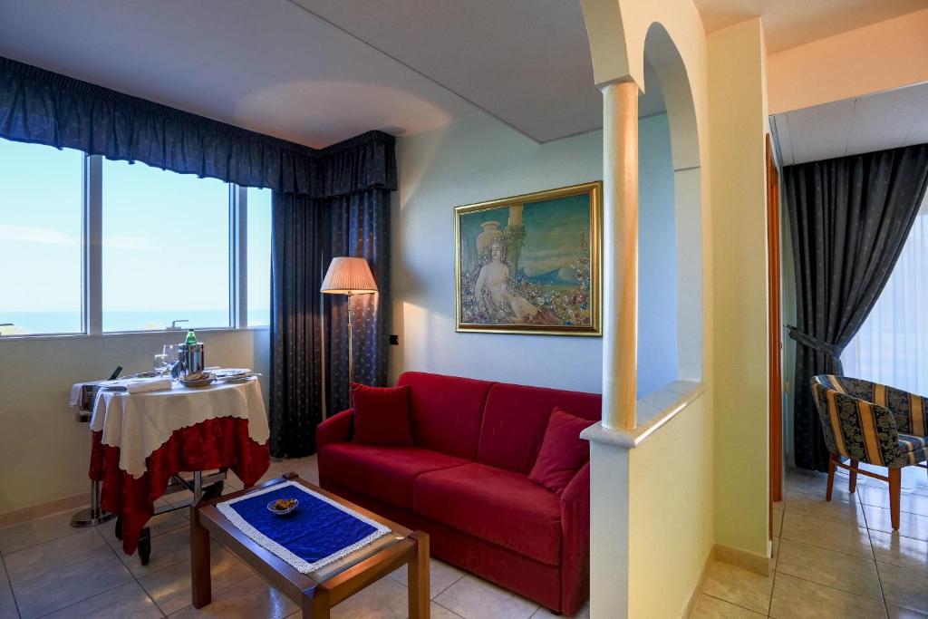 Posezení v ubytování Hotel Ambassador