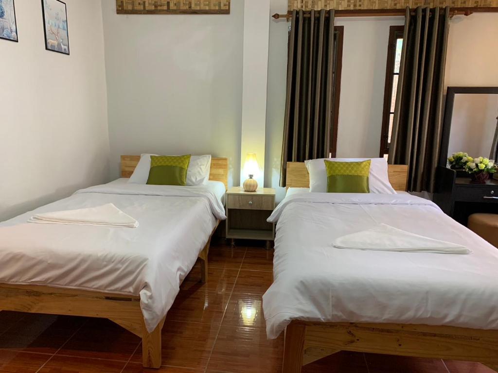 Postel nebo postele na pokoji v ubytování Hotel Pailifornia