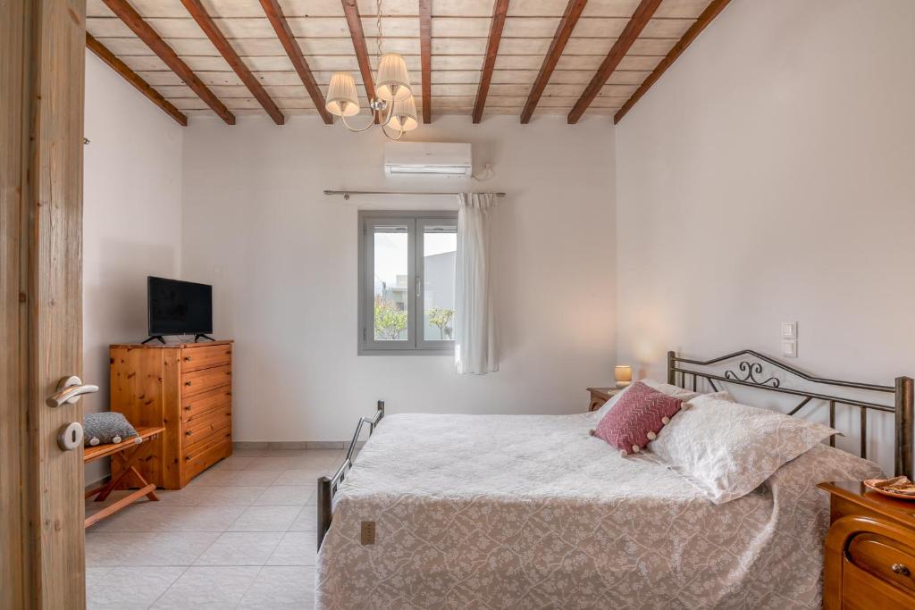 Posteľ alebo postele v izbe v ubytovaní Lahardi - Seaside House