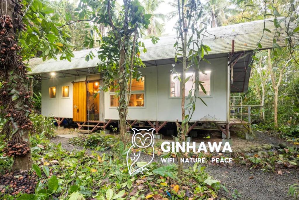 a house in the middle of the forest at Private Nature Retreat w/Brick Oven & Hiking in Lipa