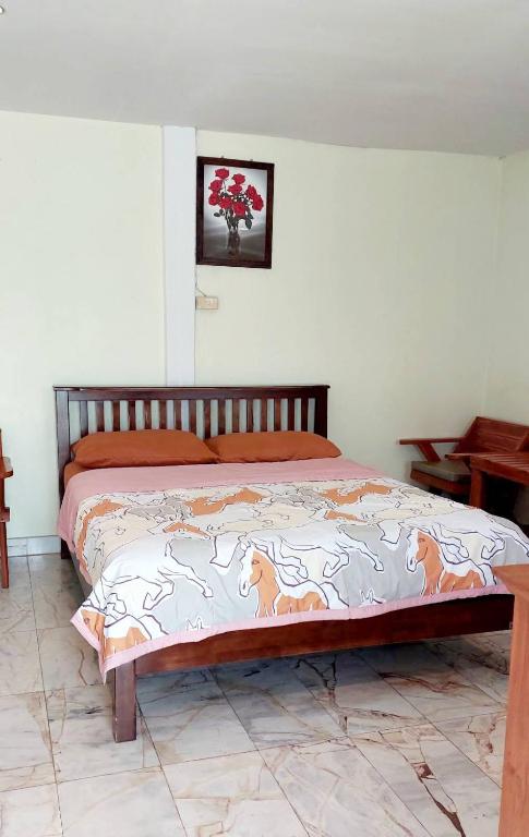 Postel nebo postele na pokoji v ubytování Tientong Guesthouse