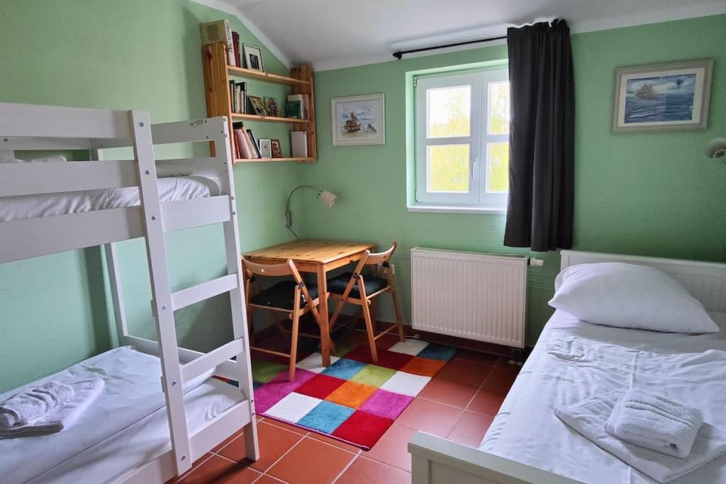 Postel nebo postele na pokoji v ubytování Strandläufer