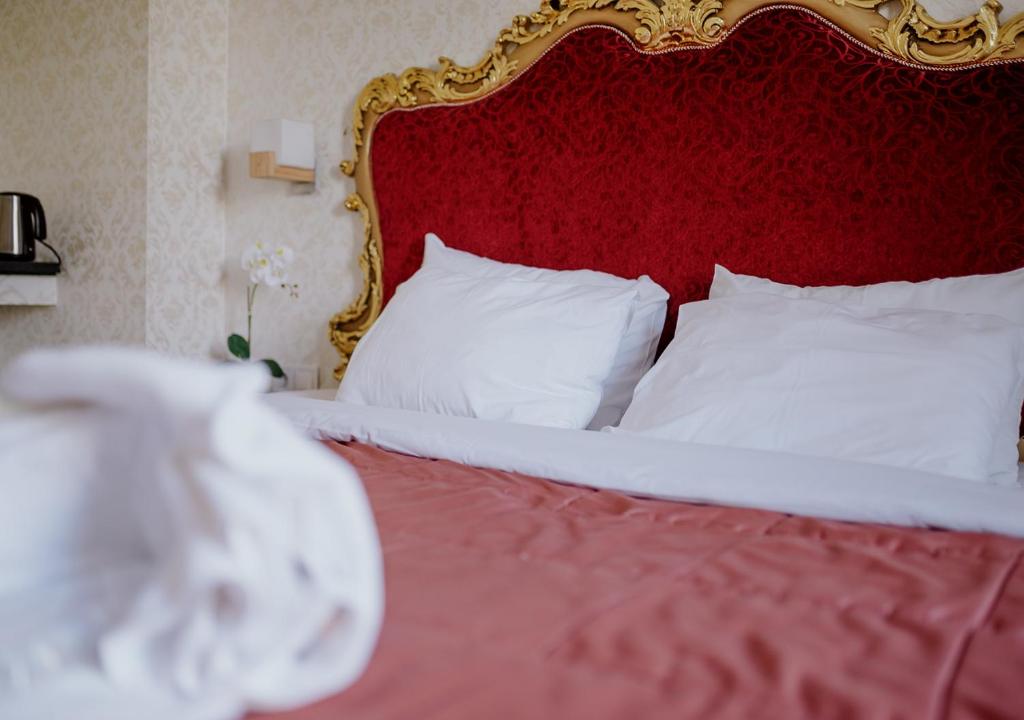 Posteľ alebo postele v izbe v ubytovaní ROH Suites