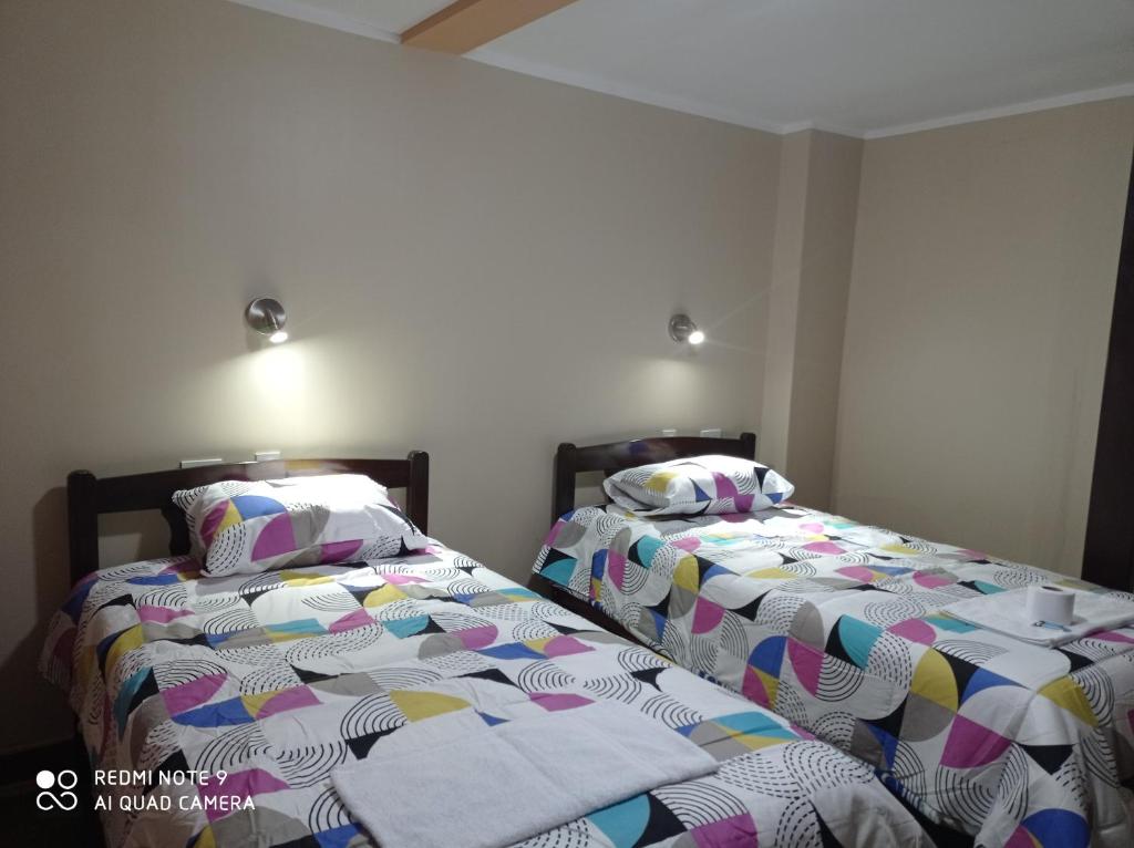 Кровать или кровати в номере Casa Hospedaje VIRREY