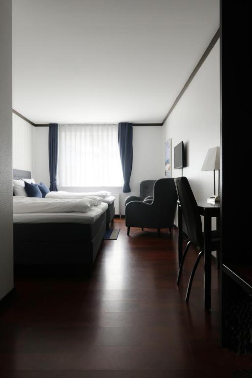 Postelja oz. postelje v sobi nastanitve Helnan Phønix Hotel