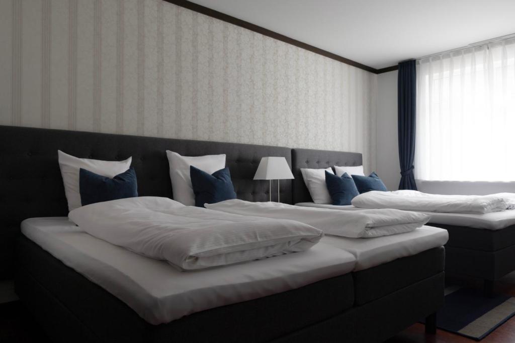 Postelja oz. postelje v sobi nastanitve Helnan Phønix Hotel