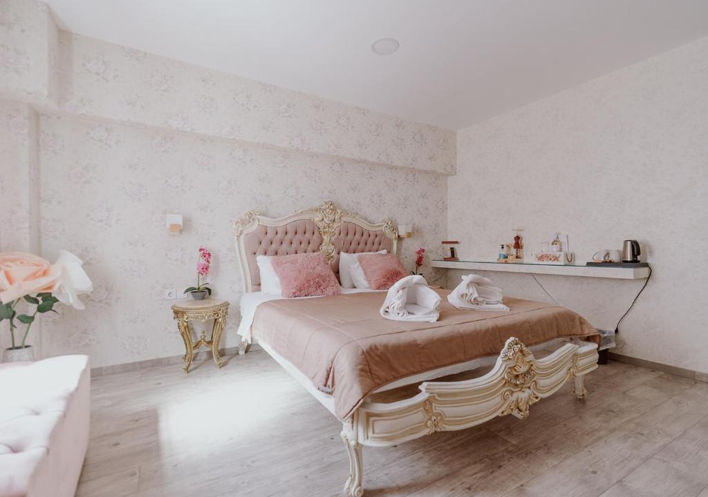 Posteľ alebo postele v izbe v ubytovaní ROH Suites
