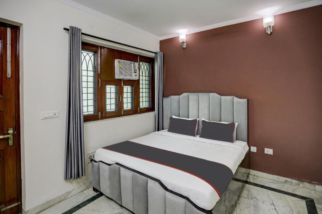 Fotografie z fotogalerie ubytování Capital O Uk House Residency v destinaci Gurgáon