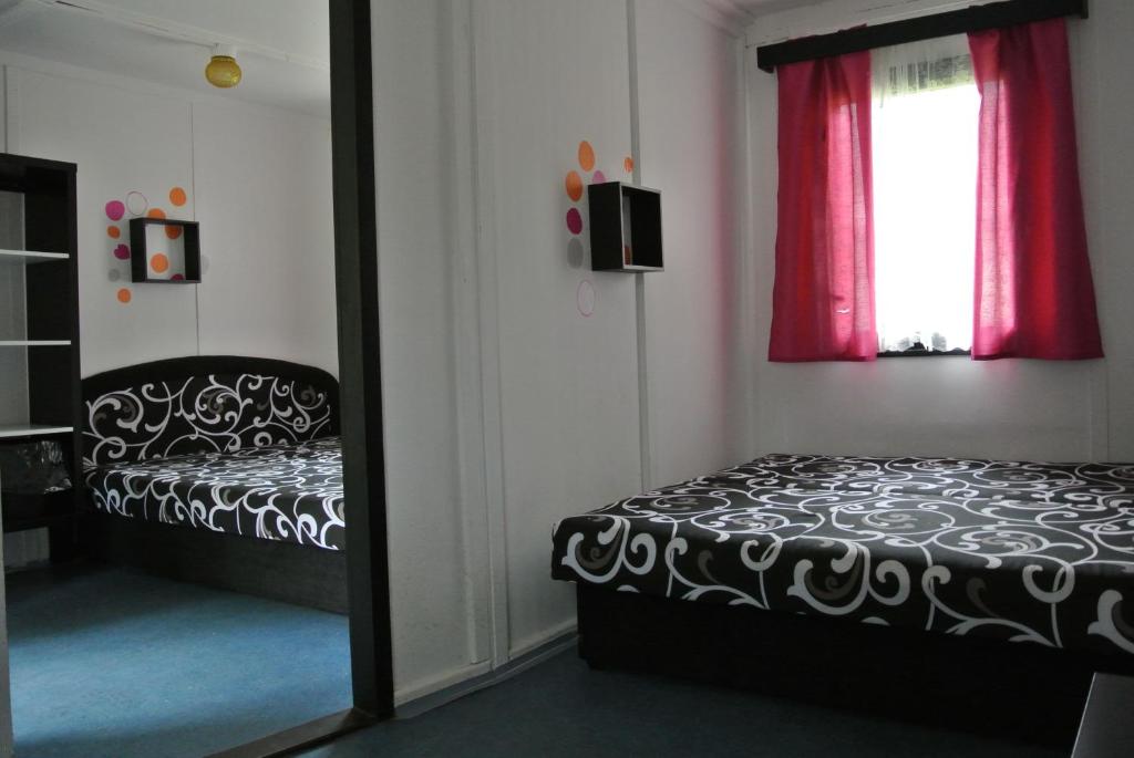 Postel nebo postele na pokoji v ubytování Juniorcamp Nová Živohošť