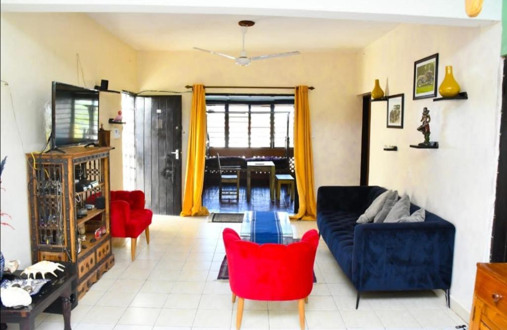 Гостиная зона в Mavericks Convenient Cozy Loft in Diani's CBD