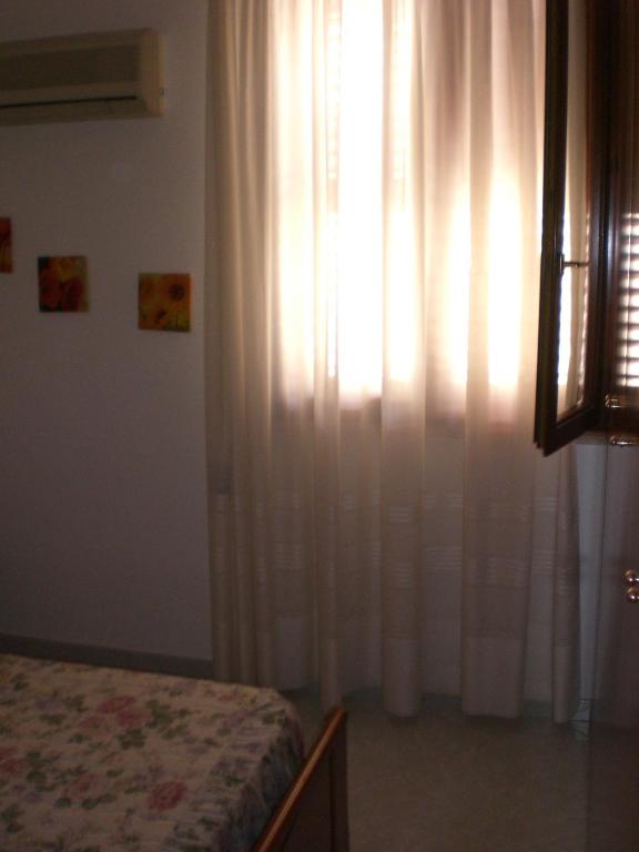 Postel nebo postele na pokoji v ubytování Casa vacanza spiaggia Praia