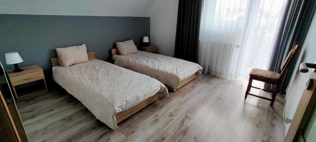 Posteľ alebo postele v izbe v ubytovaní u Iwony na Kaszubach