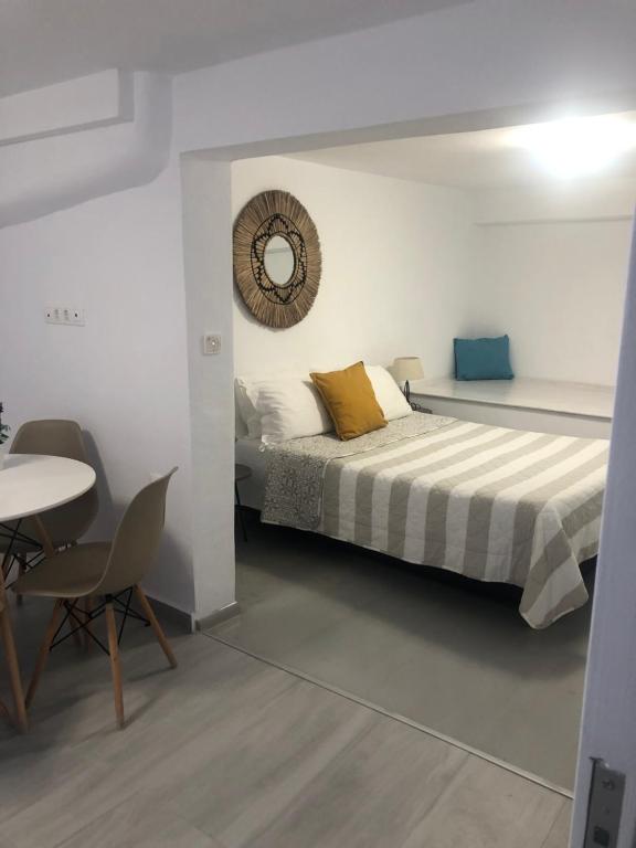 Postel nebo postele na pokoji v ubytování Afrodete Hotel