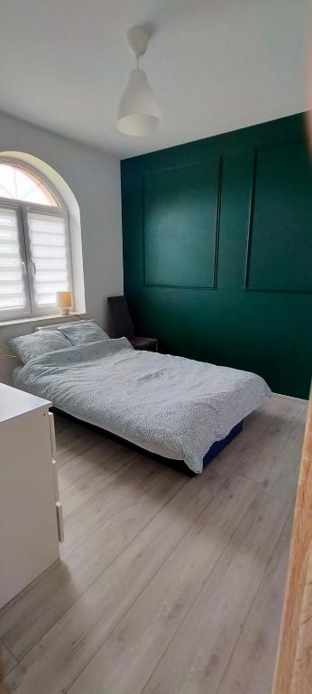 Posteľ alebo postele v izbe v ubytovaní u Iwony na Kaszubach