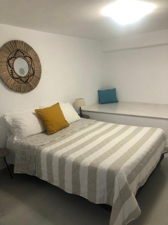Postel nebo postele na pokoji v ubytování Afrodete Hotel