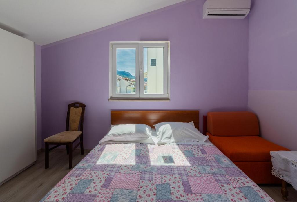 Posteľ alebo postele v izbe v ubytovaní Apartments Ribarević